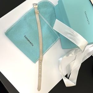 Authentic Tiffany & Co Buckle bracelet. Never worn, in original box/pouch